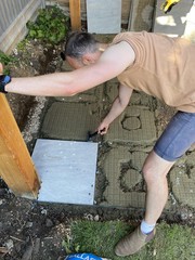 Placing the tiles. Not on a screed...