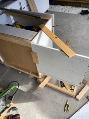 Building the fridge enclosure with temporary fixtures nailed in