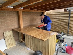 Oiling the top with help from my Dad