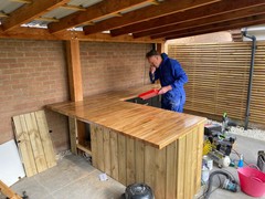 Oiling the top with help from my Dad