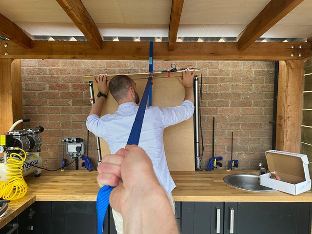 Controlled install of cabinet