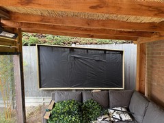 Plant wall with weed membrane to block light