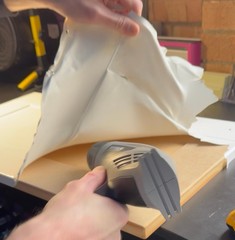 Stripping the plastic coating using a heat gun