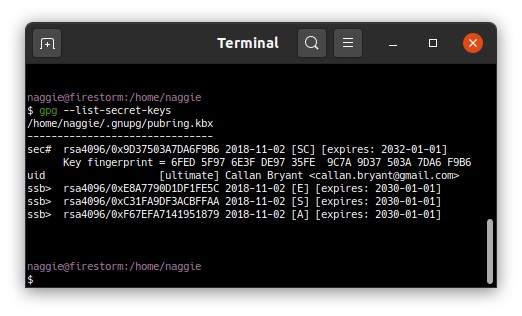 The resulting key topology loaded into GnuPG2. Note the > which indicates the private key is on the yubikey. The keys also have ultimate trust.