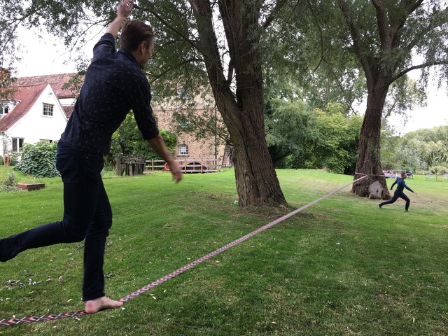 Slacklining at lunchtime, 2018. Slackline combat was defined as an official QMS procedure, and was a great way of settling disputes! We once had it over the pond for the ultimate experience. That's Leo running away after a shameful defeat.