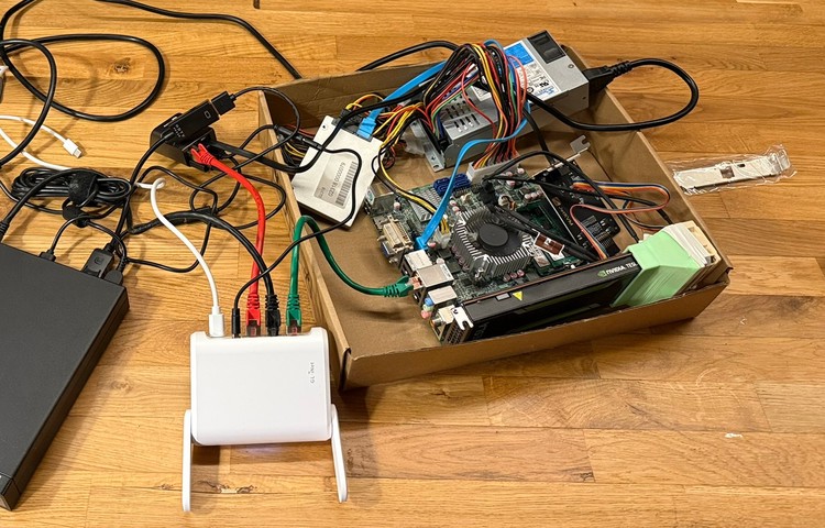 The messy test setup. Yes, I know the fans are blocked in the picture. Oops!
